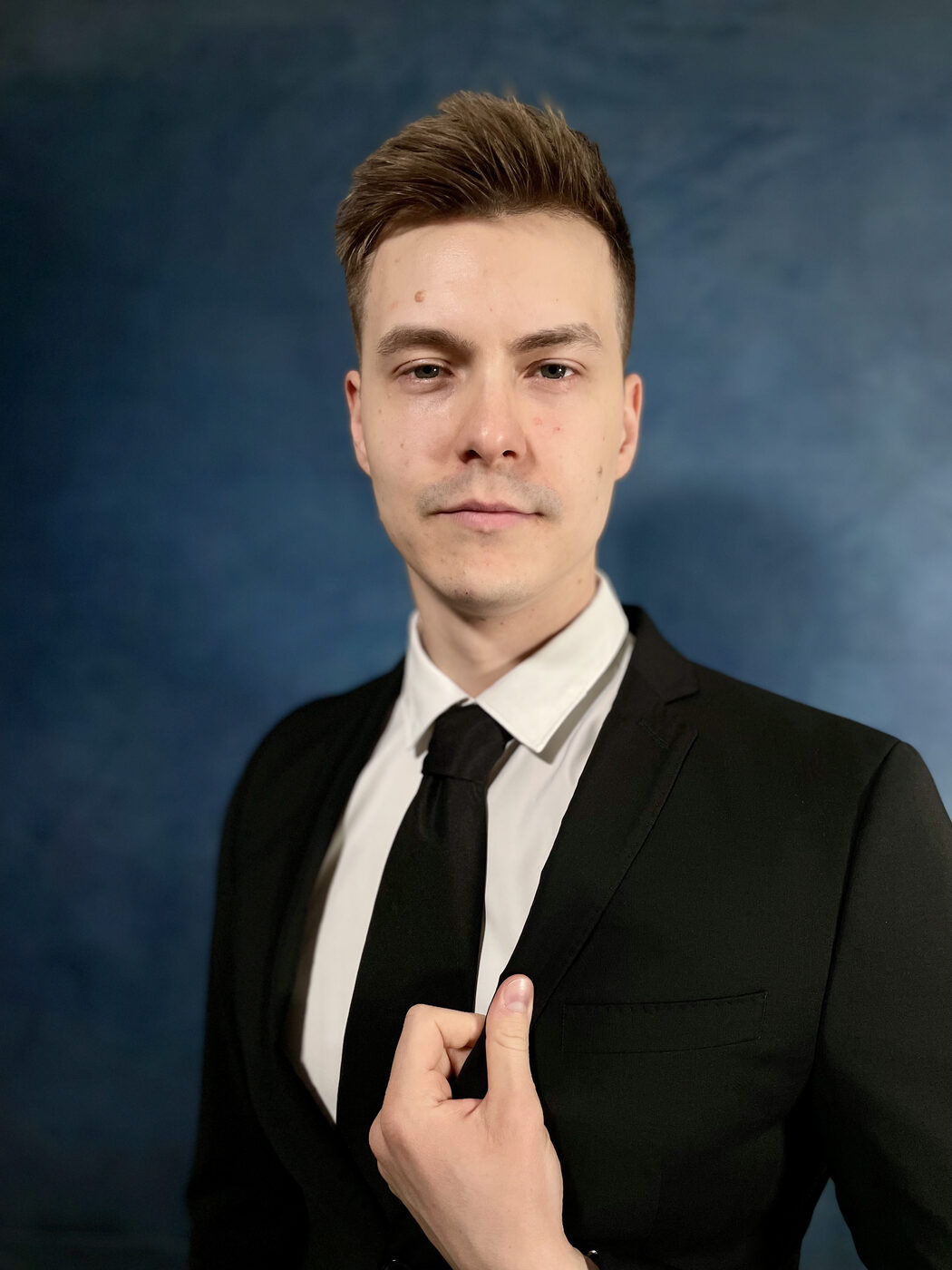 Leo Matijevic — headshot in suit